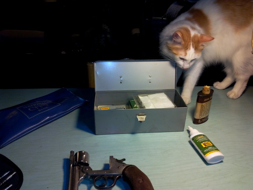 STEWART HELPING WITH GUN.jpg