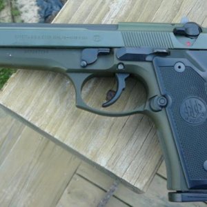 My first handgun, Beretta 92fs in Olive Drab.