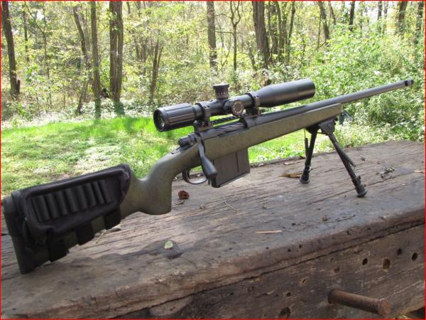 Edwin's REM 700 L(slash)A Cerakoted in sniper grey microslick bolt .338 Lapua