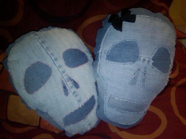 Two skulls pillows from recycled jeans.