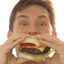 MSCAmanEatingAHamburger.jpg