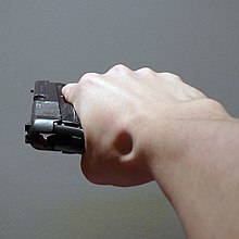 220px-Pistol_held_sideways.jpg