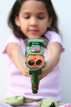 young-girl-with-toy-gun-thumb671063.jpg