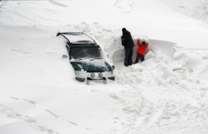 car-stuck-in-snow-avalanche-300x193.jpg