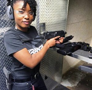 blackwomanGUN-300x295.jpg