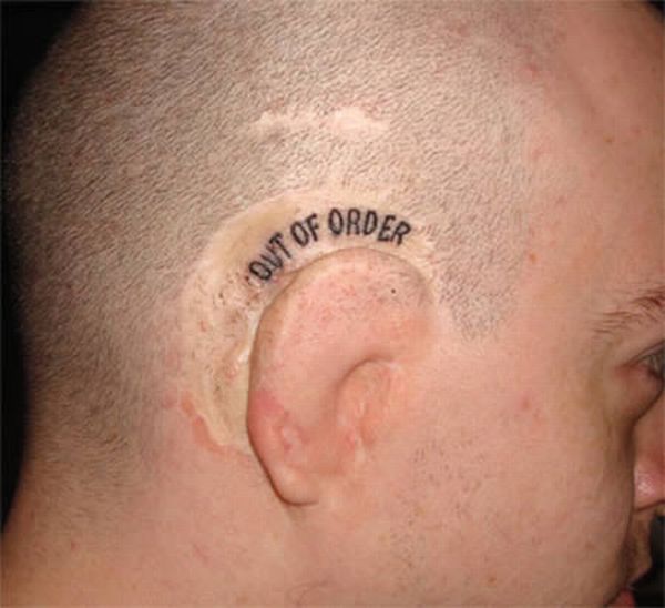 the_craziest_ear_tattoos_10.jpg