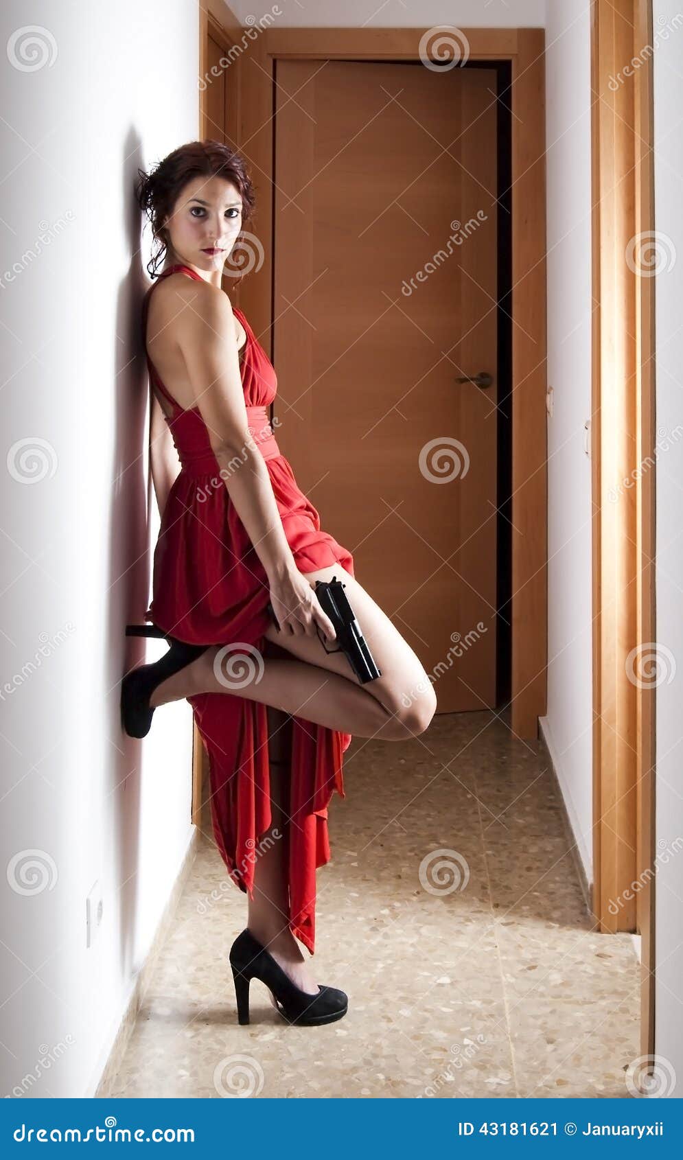 beautiful-woman-red-dress-gun-portrait-young-hallway-43181621.jpg