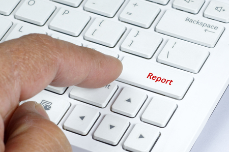 44590011-close-up-view-of-white-keyboard-report-button.jpg