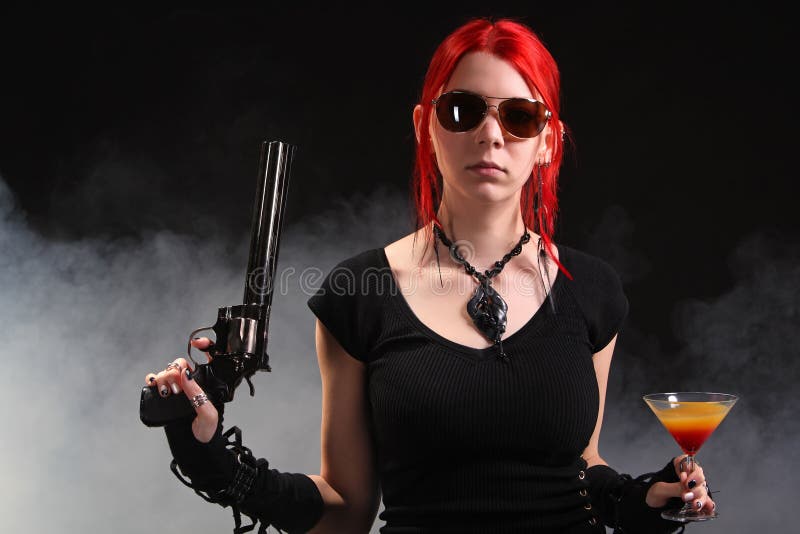 sexy-red-hair-woman-gun-cocktail-39657308.jpg