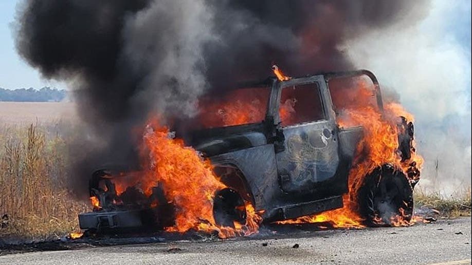 U.S. mail truck on fire