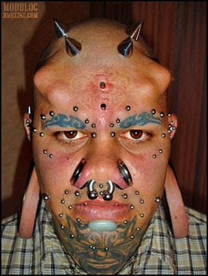 extreme_body_piercing_and_implants.jpg